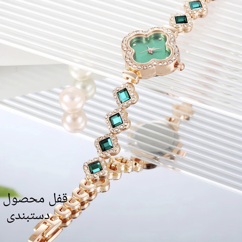 ساعت مچی عقربه ای زنانه مدل دور نگین طرح زمردی
