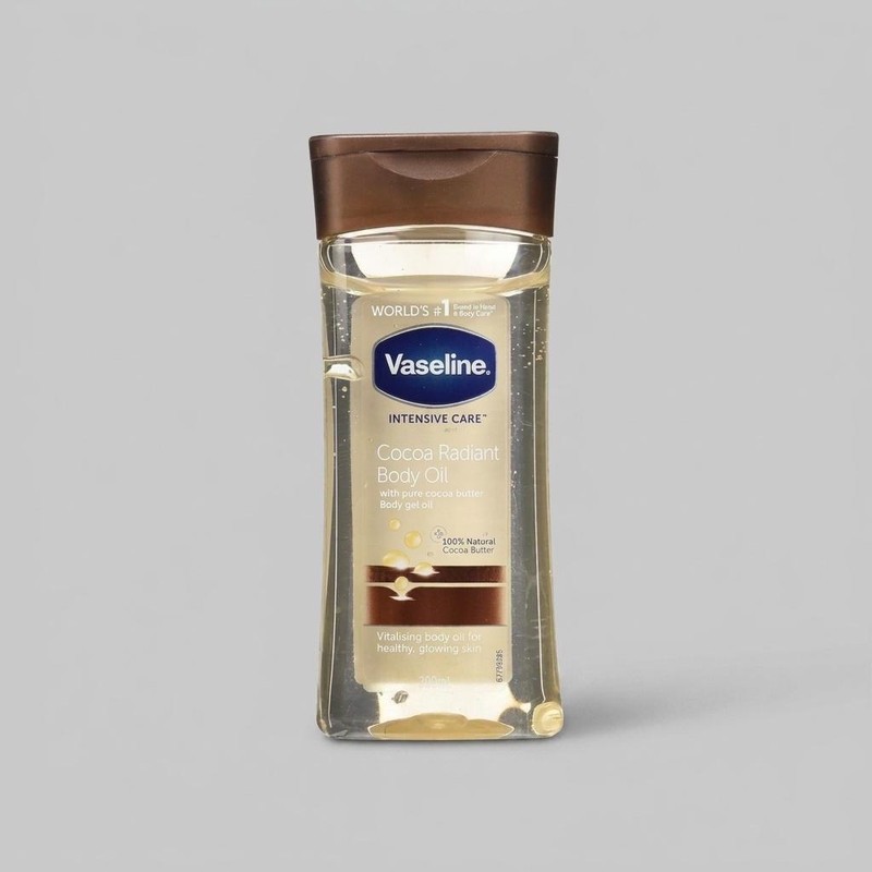روغن بدن وازلین مدل Cocoa Butter حجم 200 میلیلیتر حاوی کره کاکائو خالص، ترمیمکننده پوست خشک و حساس، جذب سریع، حفظ رطو...